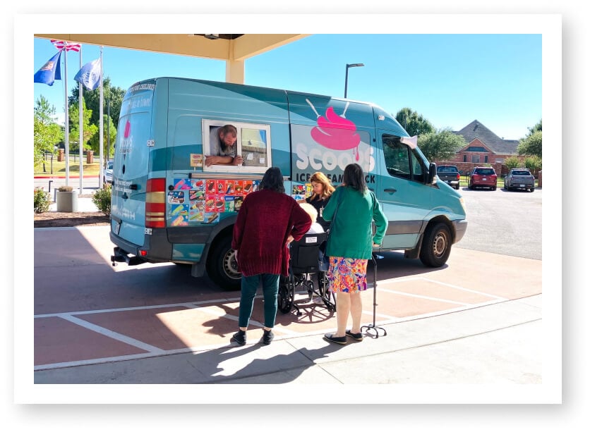 Elderly Residents Enjoying Ice Cream Truck Visit at Assisted Living